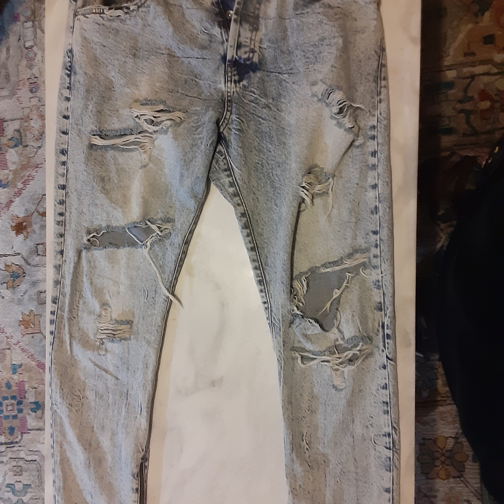 A pair of Zara blue jeans.